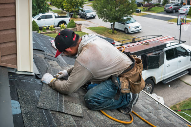 Professional Roofing technician working in Bland, VA
